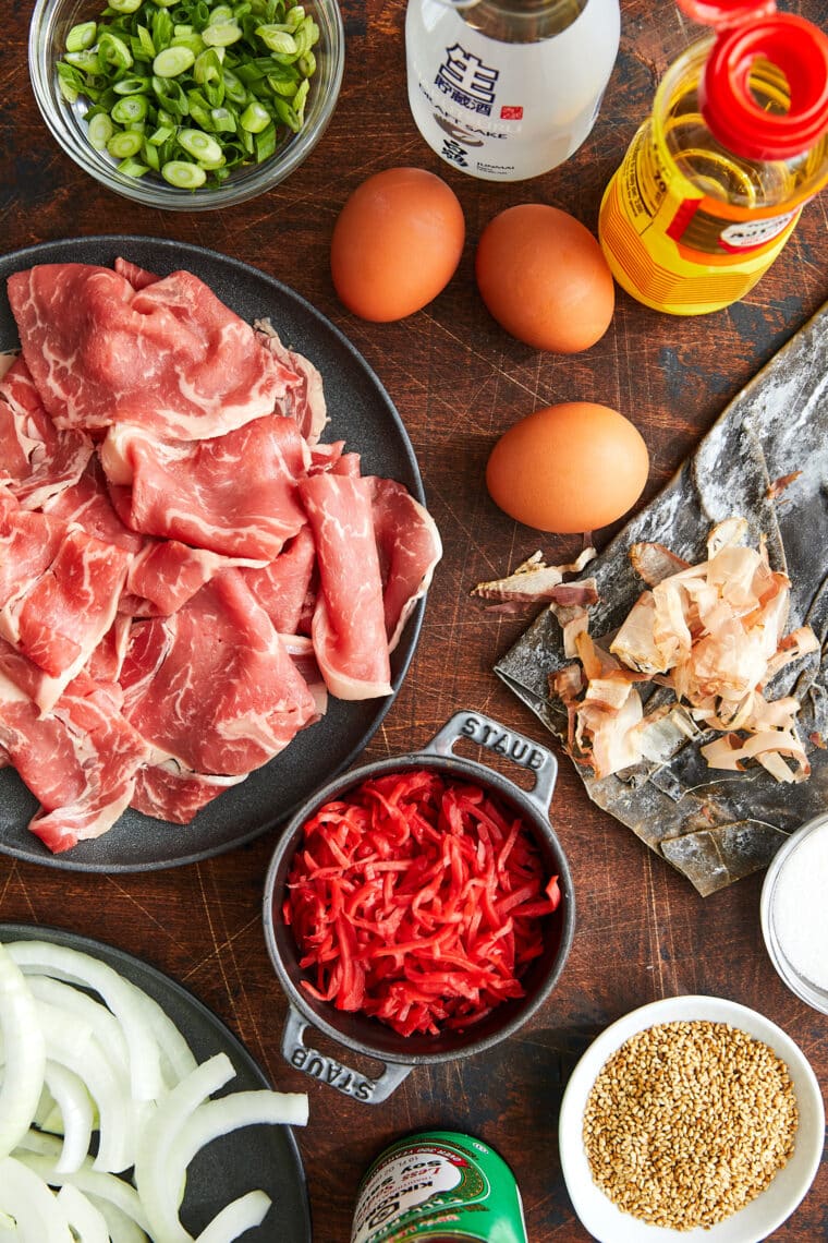 Gyudon (Japanese Beef Rice Bowl) - A weeknight favorite with thinly sliced beef + tender onions in a sweet and savory sauce! So quick + easy!