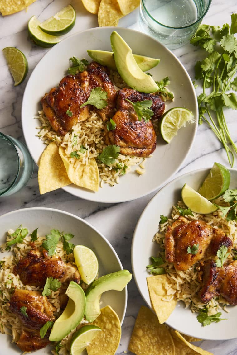 One Pan Cilantro Lime Chicken and Rice - Perfectly seasoned, juicy chicken with the fluffiest cilantro lime rice, all made in one pot. YES!