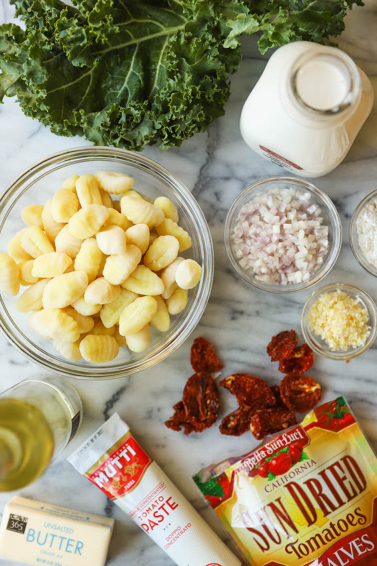Sun Dried Tomato Chicken and Gnocchi - Tender, juicy chicken thighs in an AMAZING garlicky sun dried tomato cream sauce. So simple, so good.